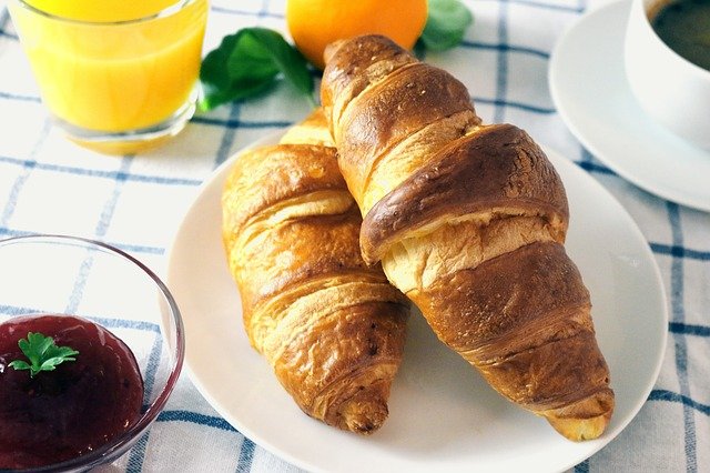 Tasty croissant and tea